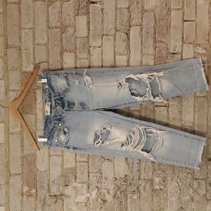 Women's Distressed / Ripped Bluejeans. Boyfriend fit. Size 3 from Garage.